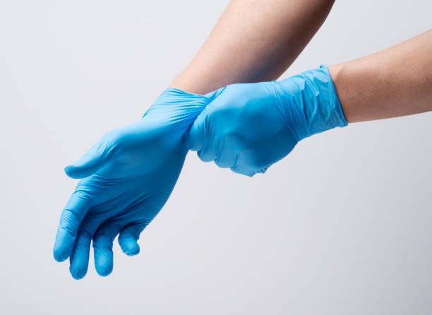 Blue nitrile glove close-up