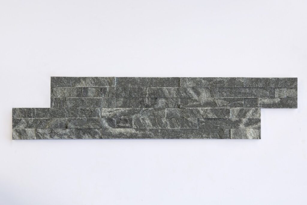 Black stone with white s