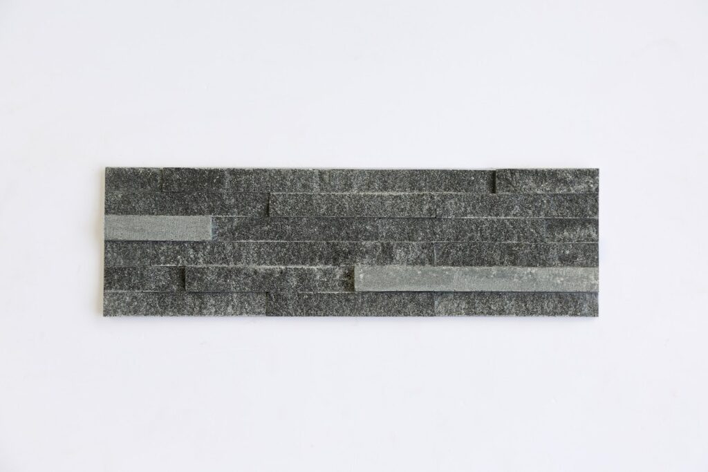 Black cross-carved stone 6 bars with 2 sanding pads