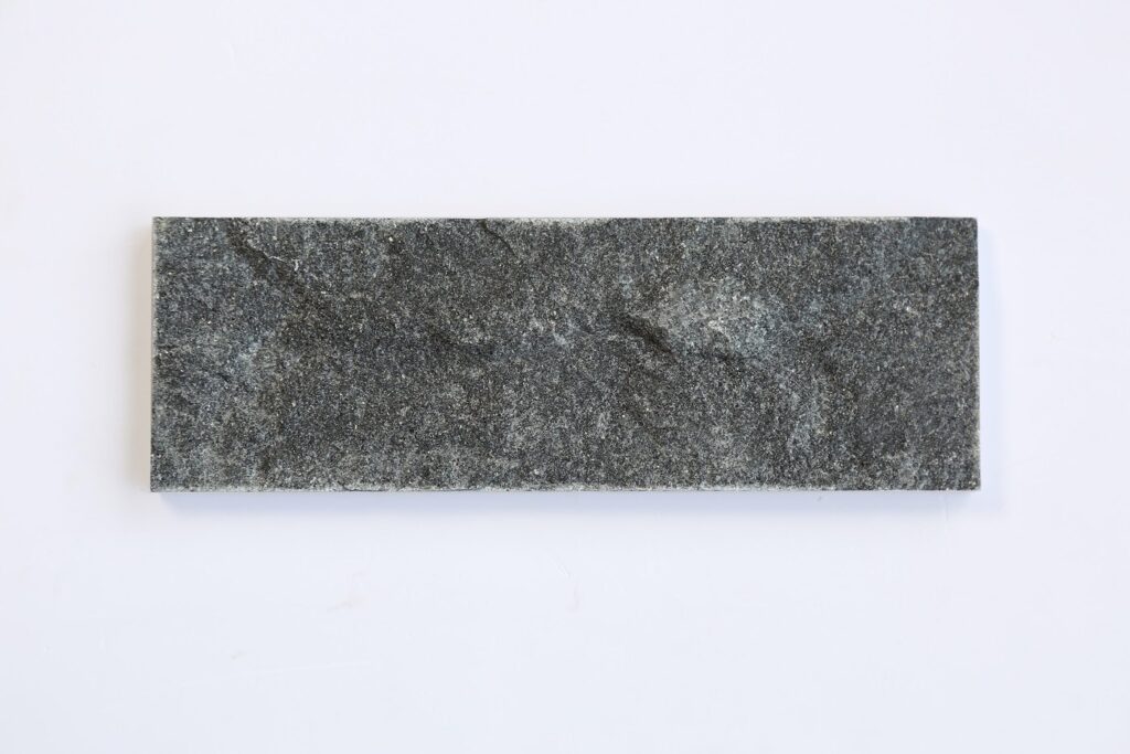 Black flat-cut stone