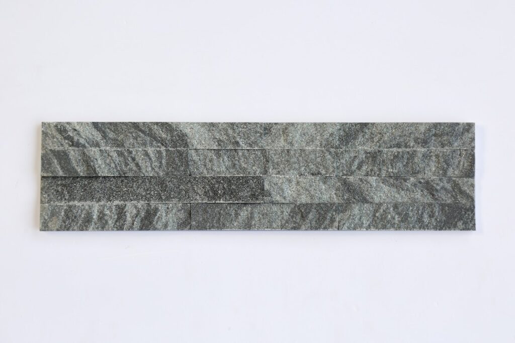 Black and white cross-carved stone 4 bars