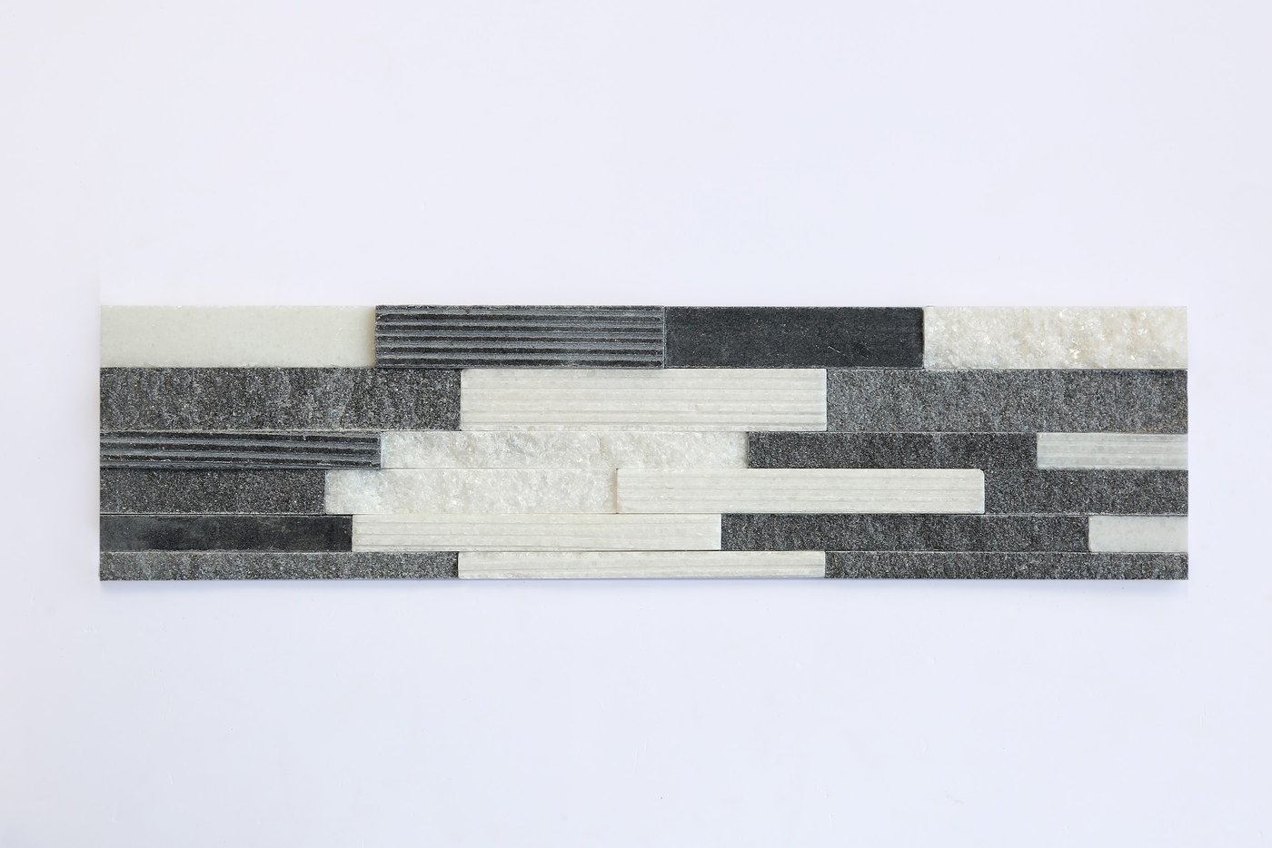 3D black and white stone with peeled, slitted, honed surface