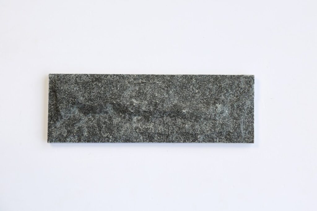 Black convex stone
